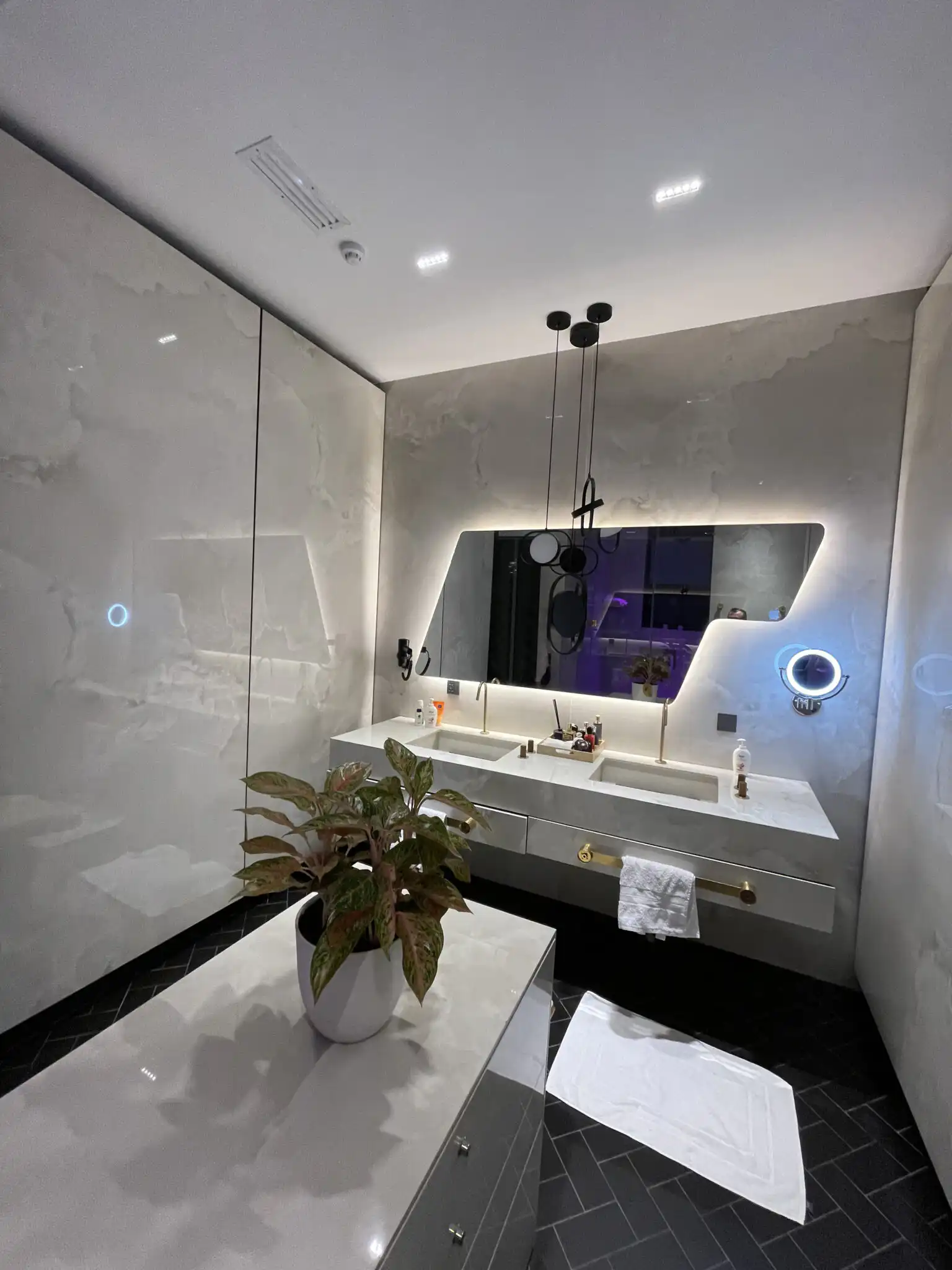 Custom backlit mirror for a bathroom remodeling project